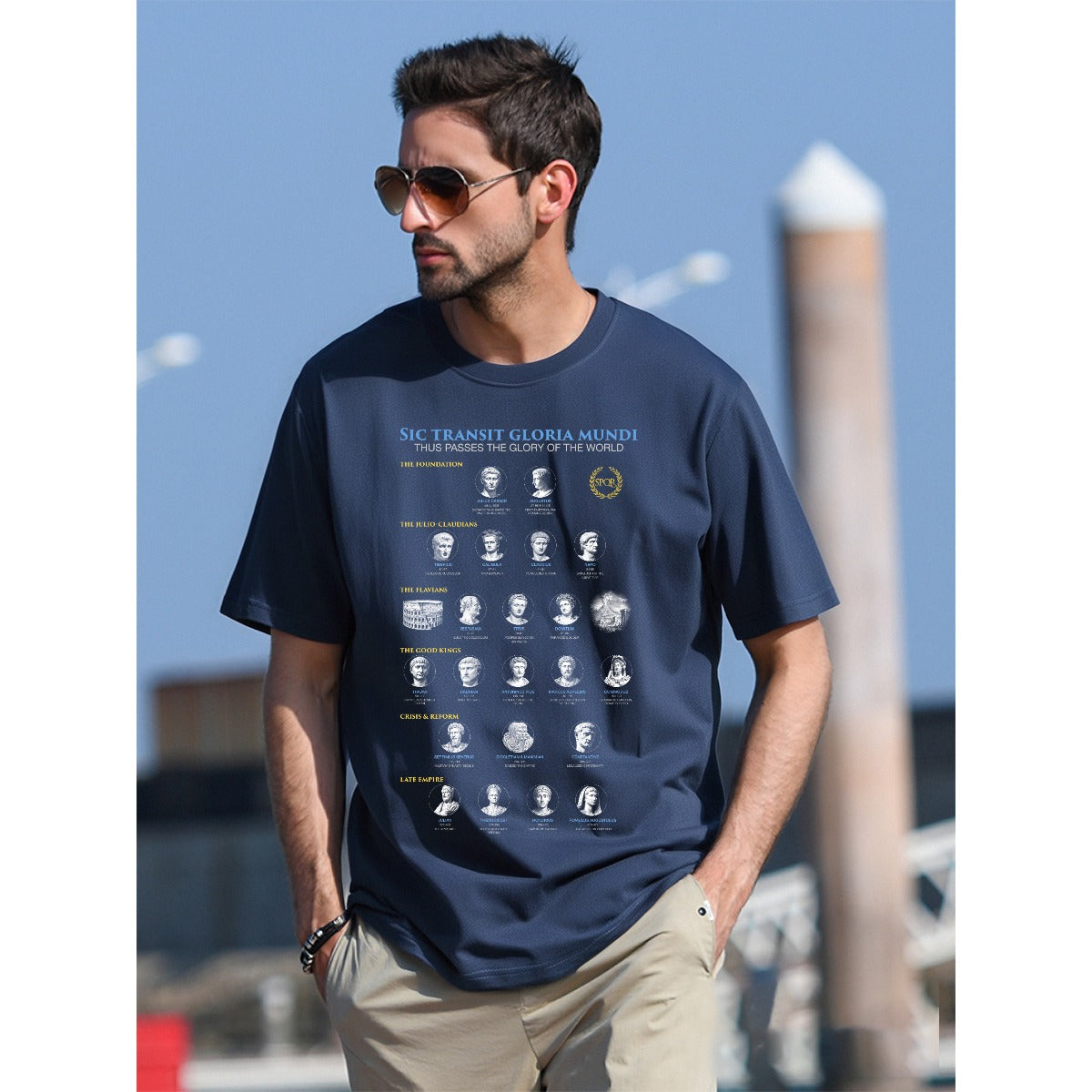 Navy blue Roman Empire history t-shirt worn by model, showing complete visual guide to Western Roman emperors with SPQR laurel wreath, Colosseum, and Pompeii illustrations